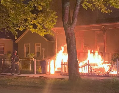 The Cleveland Fire Department quicky put out the fire on the porch.