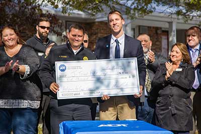 An check in the amount of $5,000 was presented to the local fire department, in thanks for their continued service to their community.