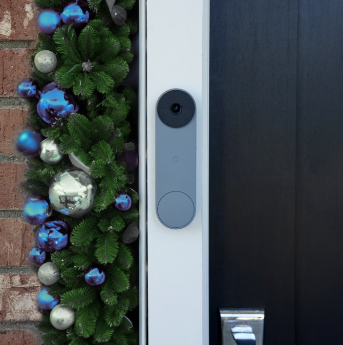 Google Nest Doorbell on a holiday decorated door