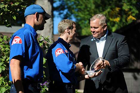 ADT employees receive Life Saver Awards from Mark Birchmeier, ADT Regional Vice President