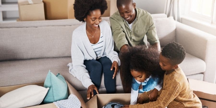 Family with moving boxes